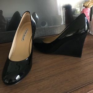 Charles David Black patent leather pumps.